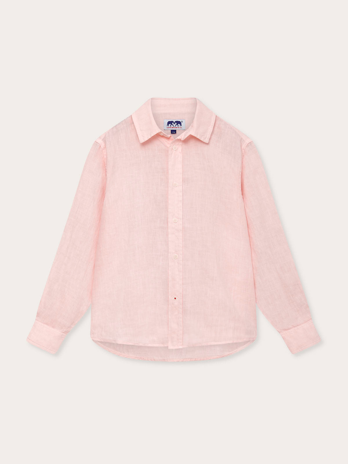 Front view of Kids Pastel Pink Abaco Linen Shirt. Pink linen shirt for kids with long sleeves and button-up design.