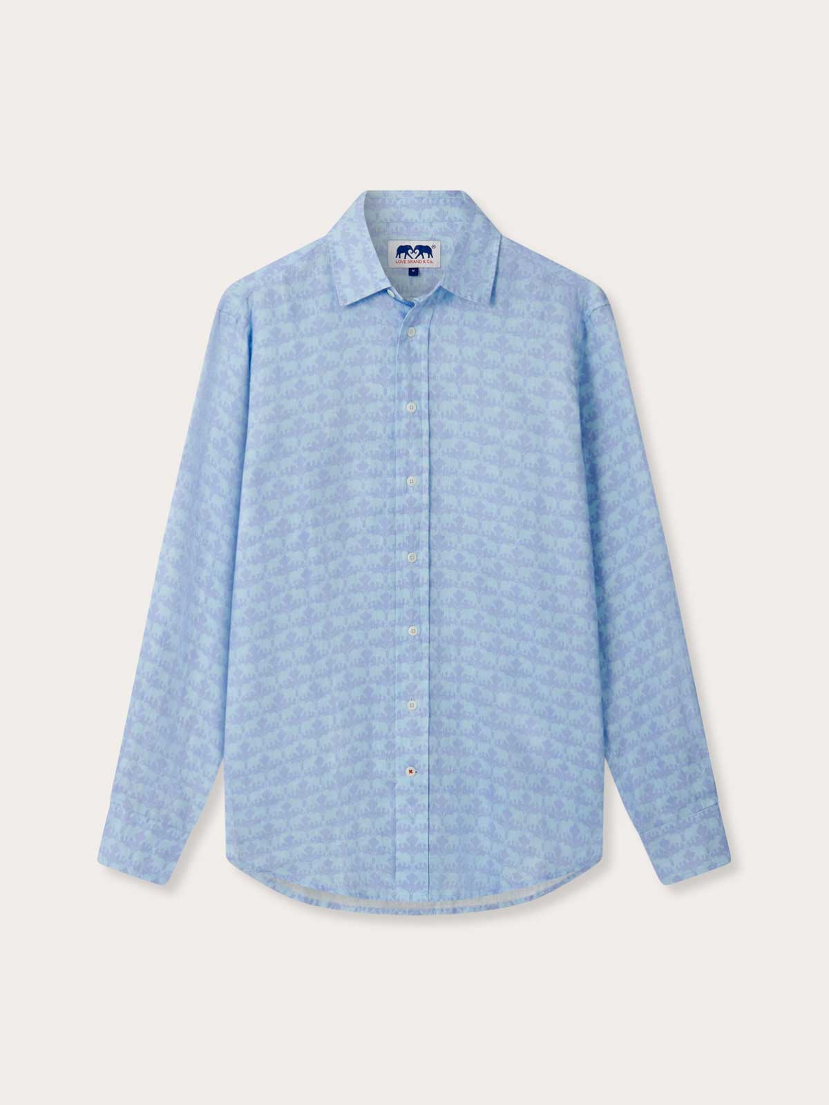Front view of Men's Elephant Dance Blue Abaco Linen Shirt. Sky blue linen shirt by love brand with long sleeves and elephant print design.