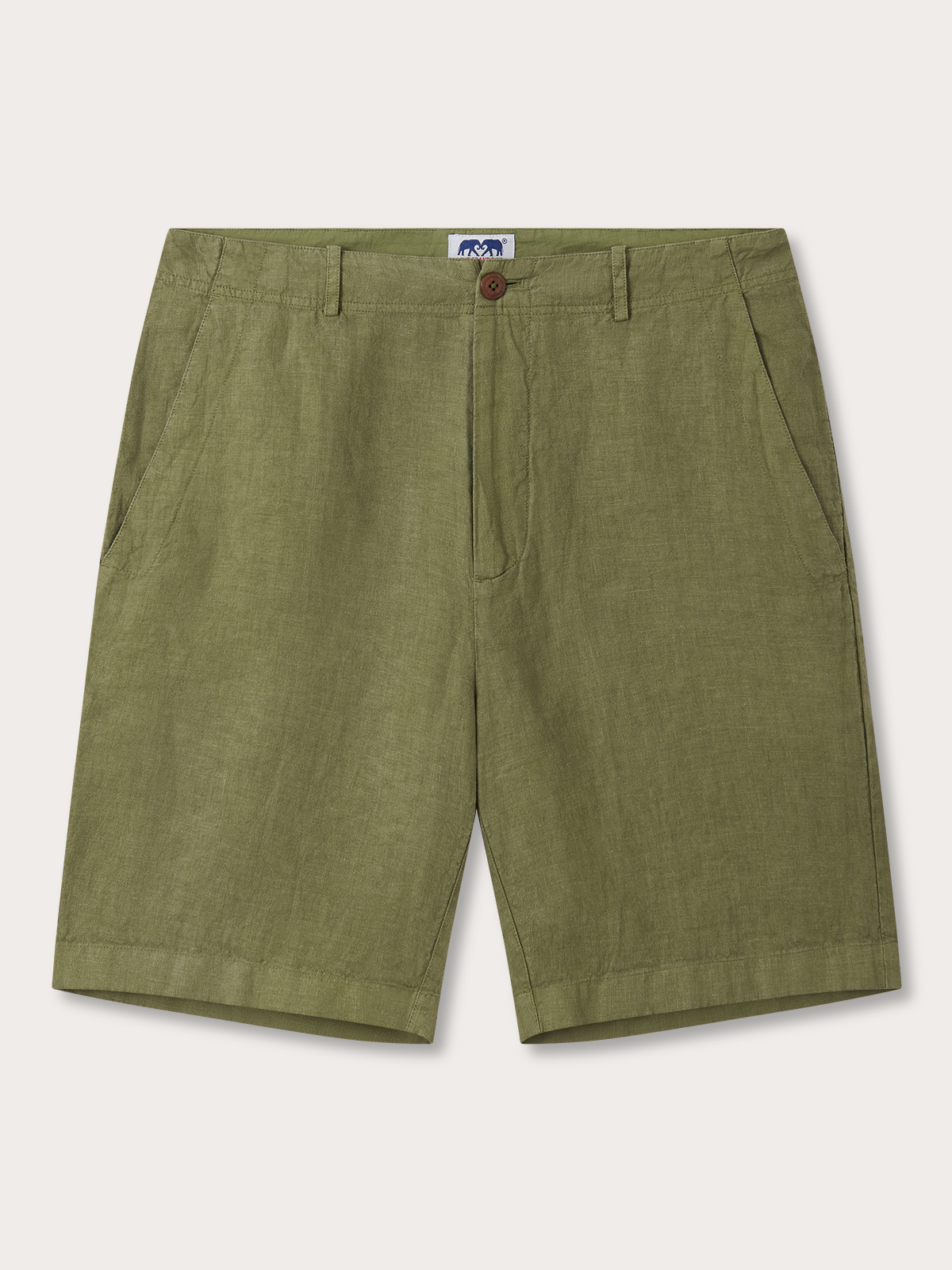Green linen shorts with side pockets and a button-up waist
