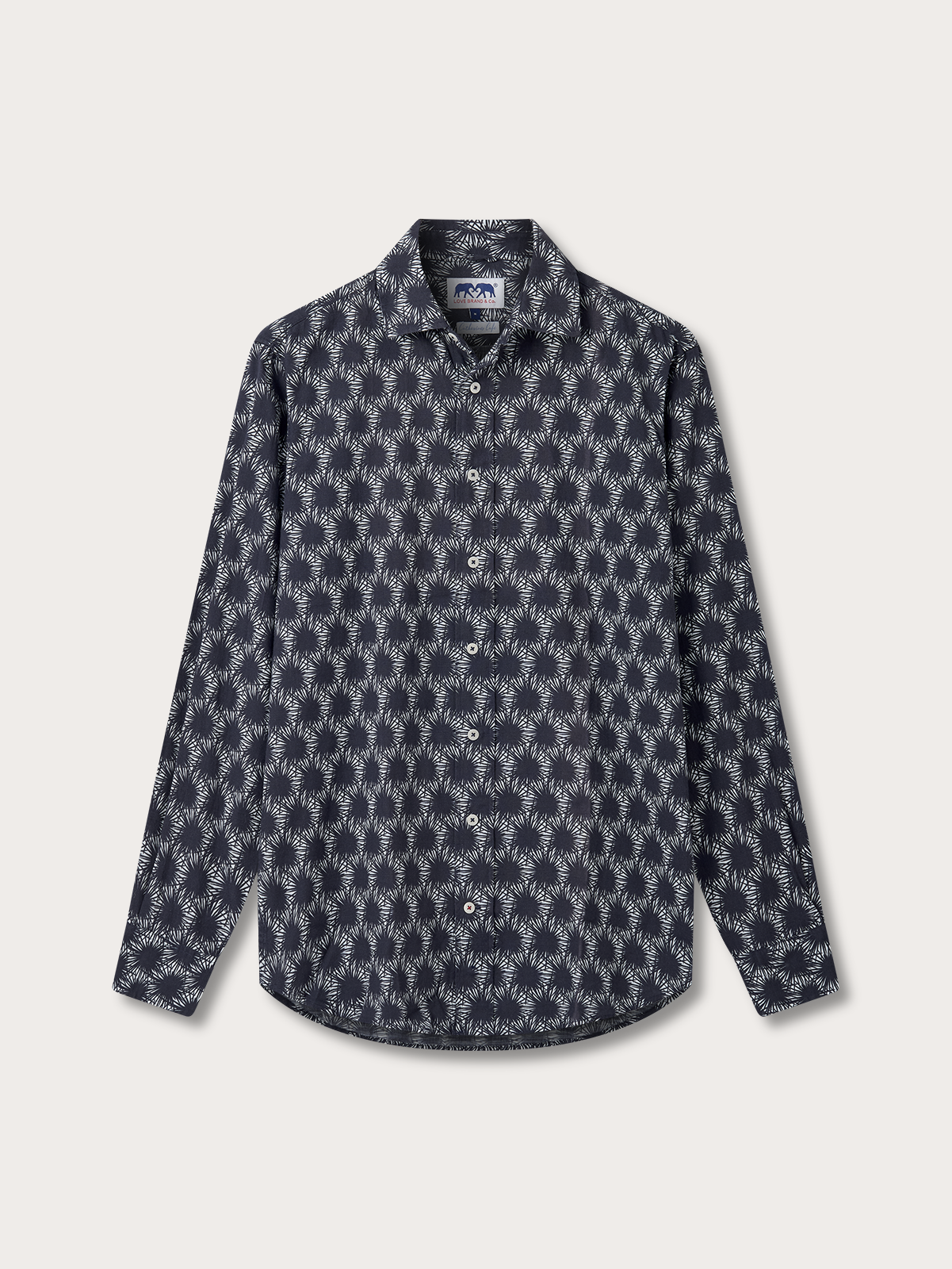 Patterned black shirt on a light grey background