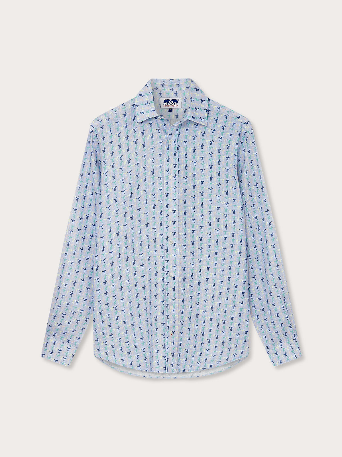 Men's Star Dancer Abaco Linen Shirt, featuring sea star motifs in pastel pink, limoncello, cay green, and deep blue on an ocean blue background.