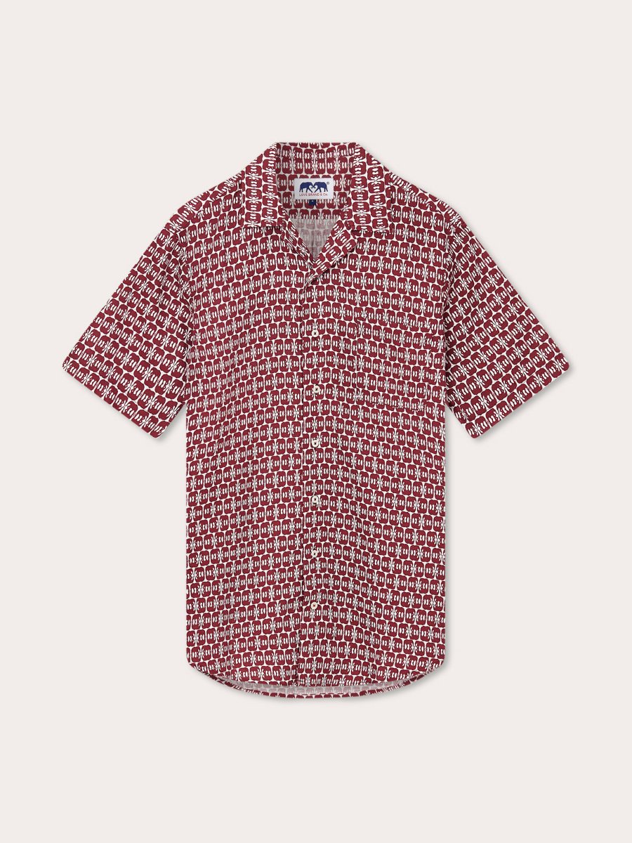 Men's Elephants of India Arawak Linen Shirt. Front view of Love Brand & Co. short-sleeved men's linen shirt featuring burgundy elephant print.