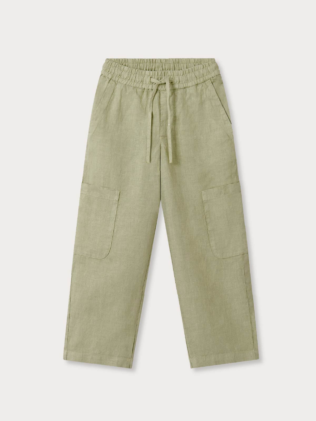 Front view of kids green linen trousers with 2 side slit pockets and 2 pockets under the knee. Trousers have a drawstring waist.