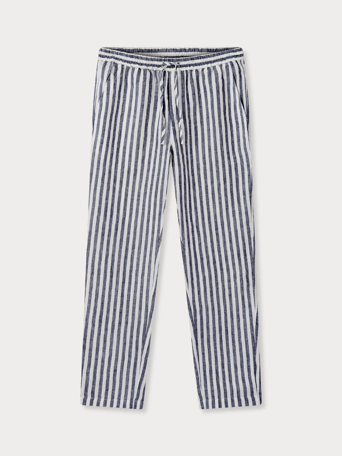 Men's Navy Lines Eleuthera Linen Trousers with thin white and navy blue stripes, displaying a casual and refined summer look.