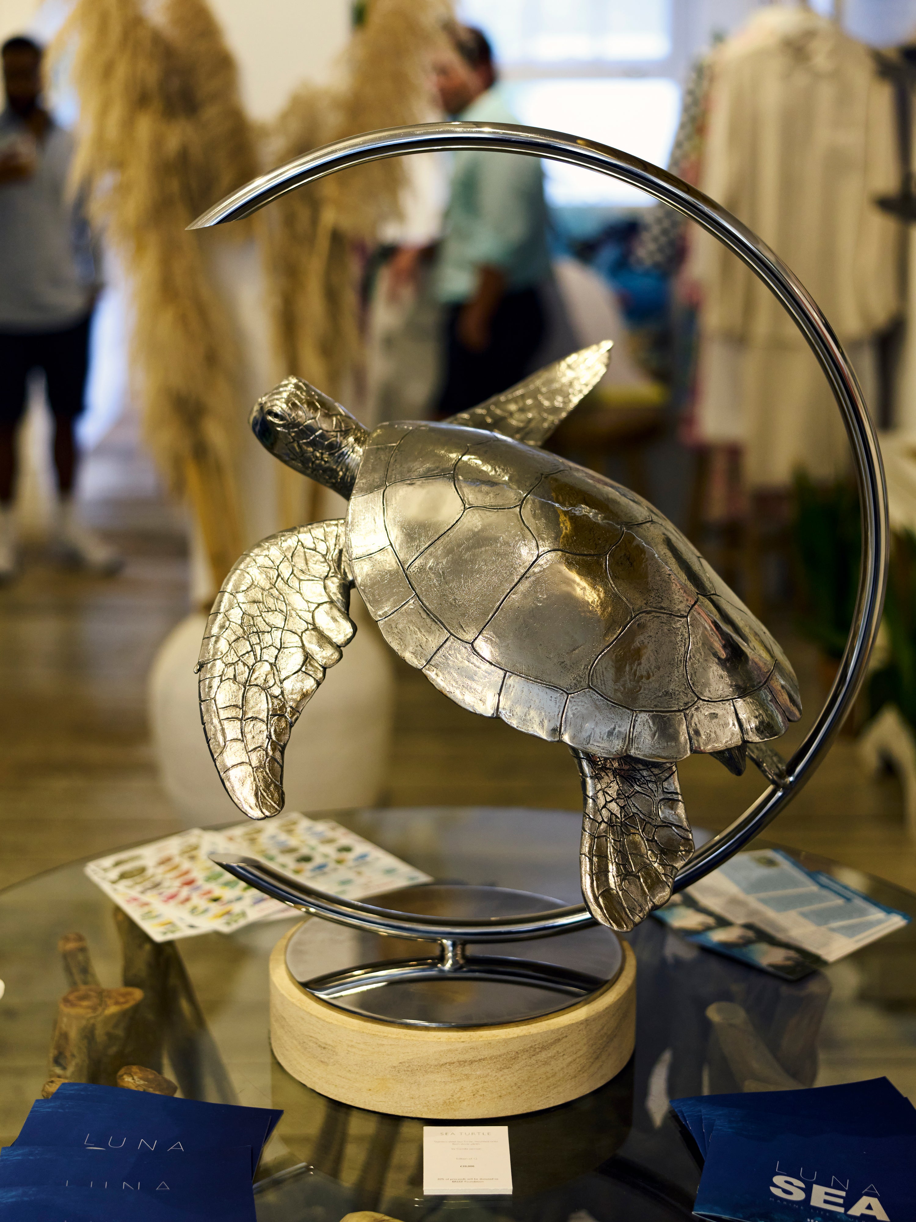 turtle sculpture on glass table
