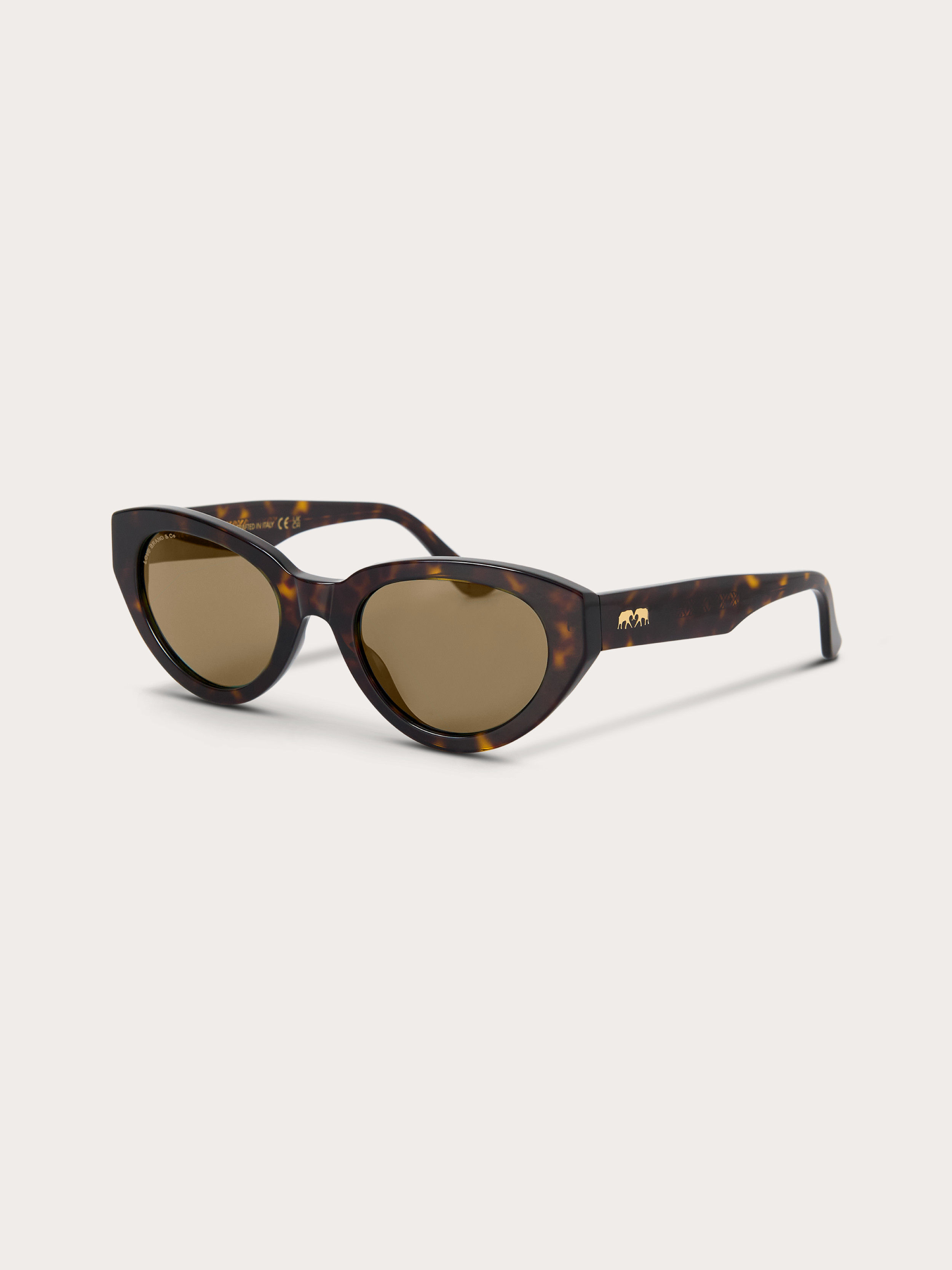side view of women's tortoiseshell sunglasses with brown lenses