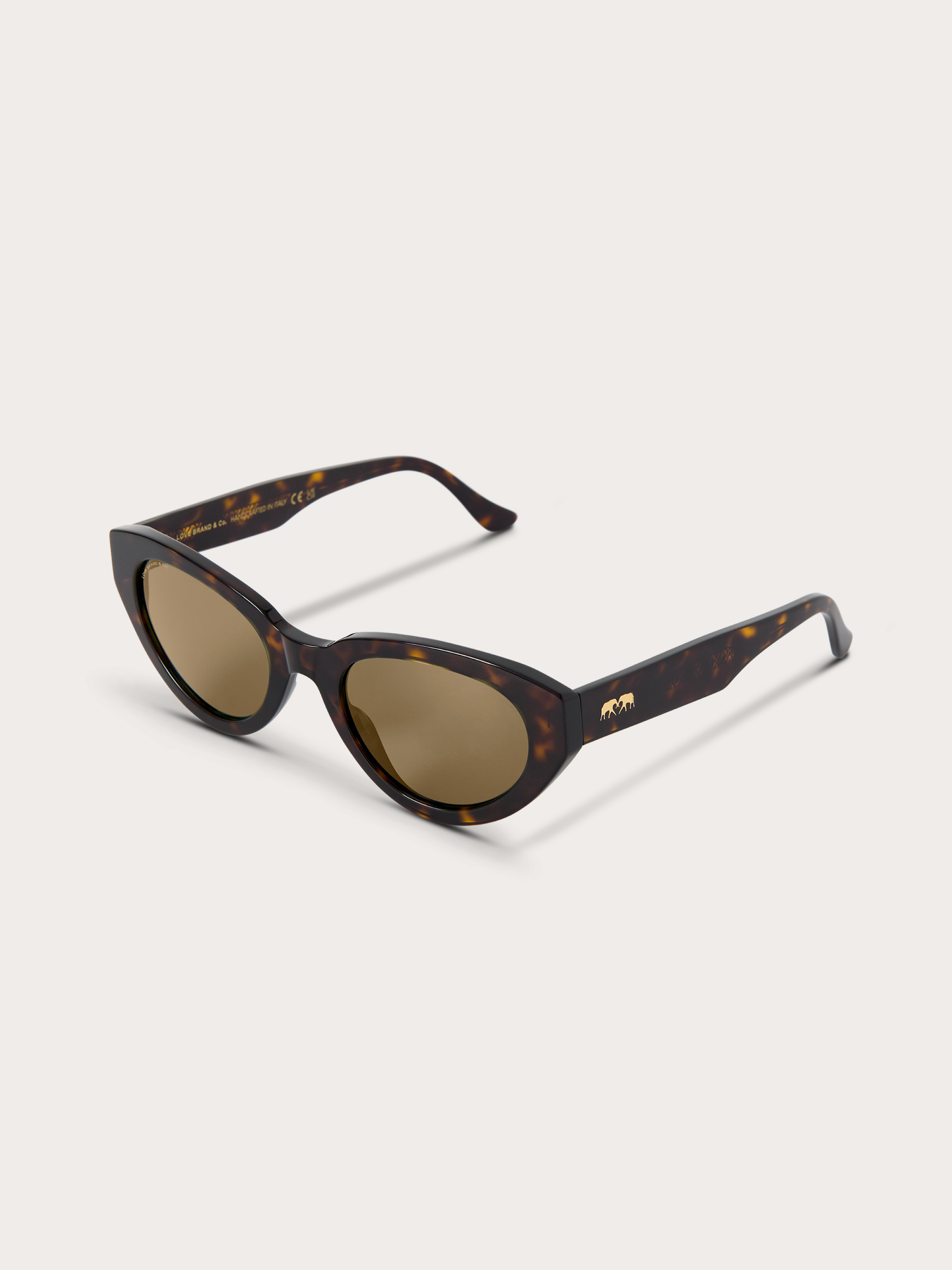 Top down view of women's tortoiseshell sunglasses with brown lenses