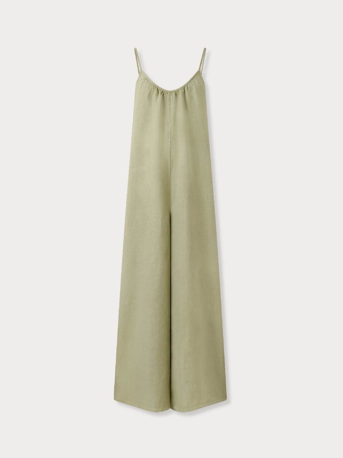 womens green linen jumpsuit on a light background