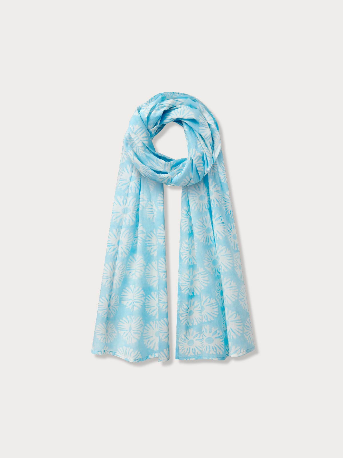 White and blue geometric 100% cotton scarf on white background.