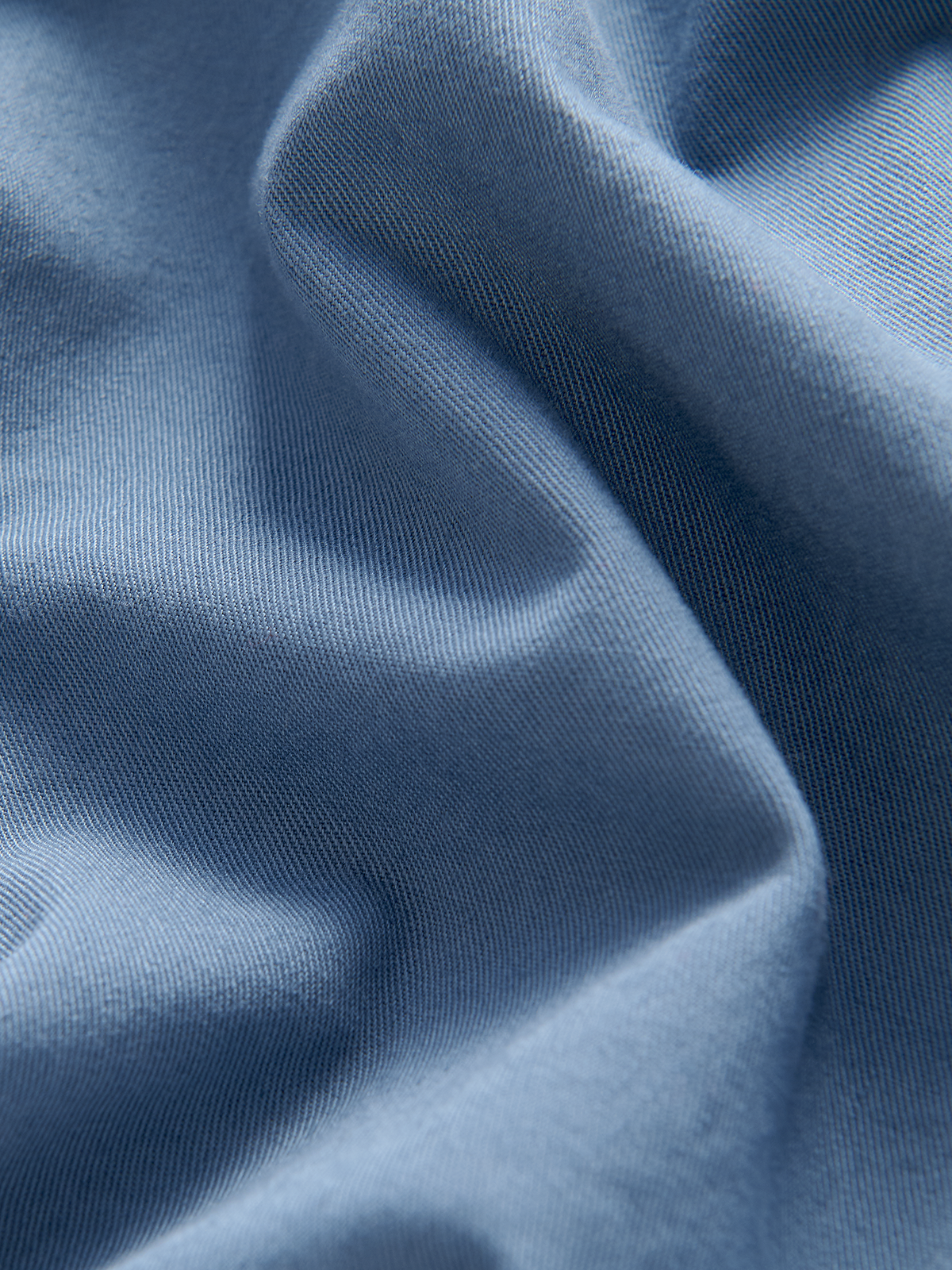 Close-up of blue cotton fabric