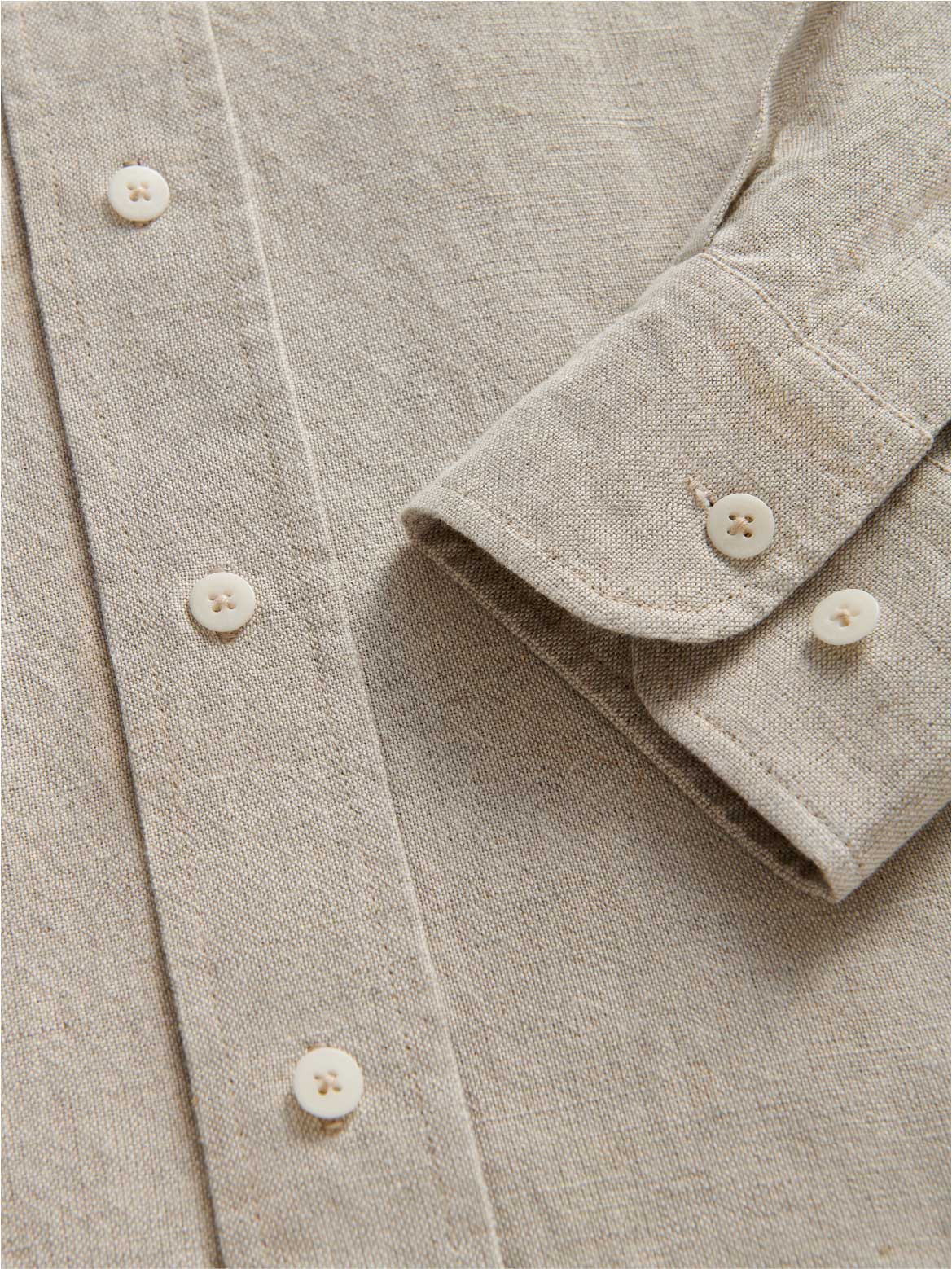 View of the cuff of mens ecru linen shirt
